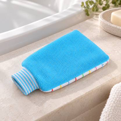 Blue Dual-Texture Bath Mitt in a bathroom setting; display props not included